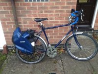 ebike with panier ready to go low pix.jpg ebike with panier ready to go low pix.jpg