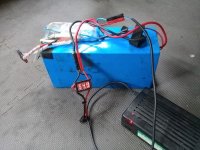 charging 7 year old ping 48v 15ah battery.jpg