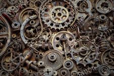111062512-steampunk-background-machine-parts-large-gears-and-chains-from-machines-and-tractors...jpg