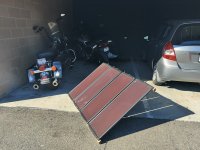 solor charging with w a harborfreight 100 watt 4 pannel system.jpg