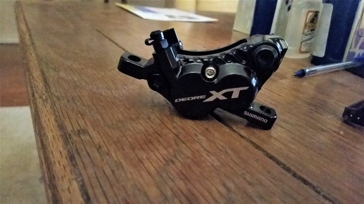 4-piston-caliper.jpg