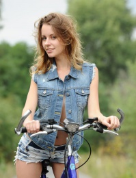 pretty_girl_gets_off_her_bike_and_shows_us_her_young_body-1.jpg